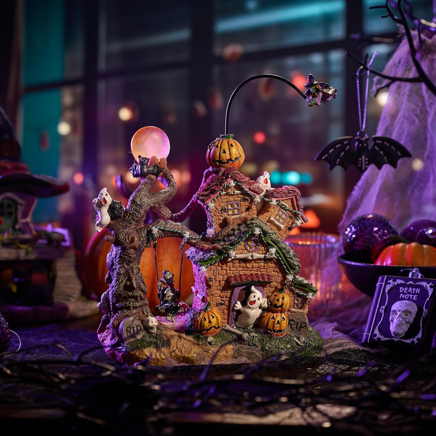 Valery Madelyn Halloween Decorations, Lighted Halloween Village Houses with Music and LED Lights, Resin Spooky Town Flying Witch and Haunted House for Home and Party Table Desk Mantel, 12 Inch